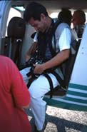 Regan as staff photographer at Troy, getting ready for aerial photography